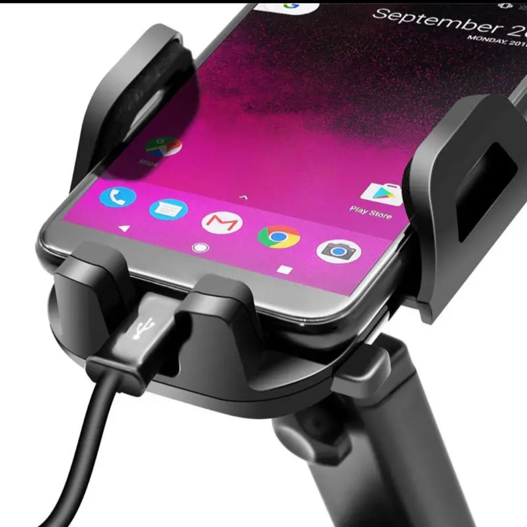 Phone holder with smartphone displaying a colorful app interface on a black background