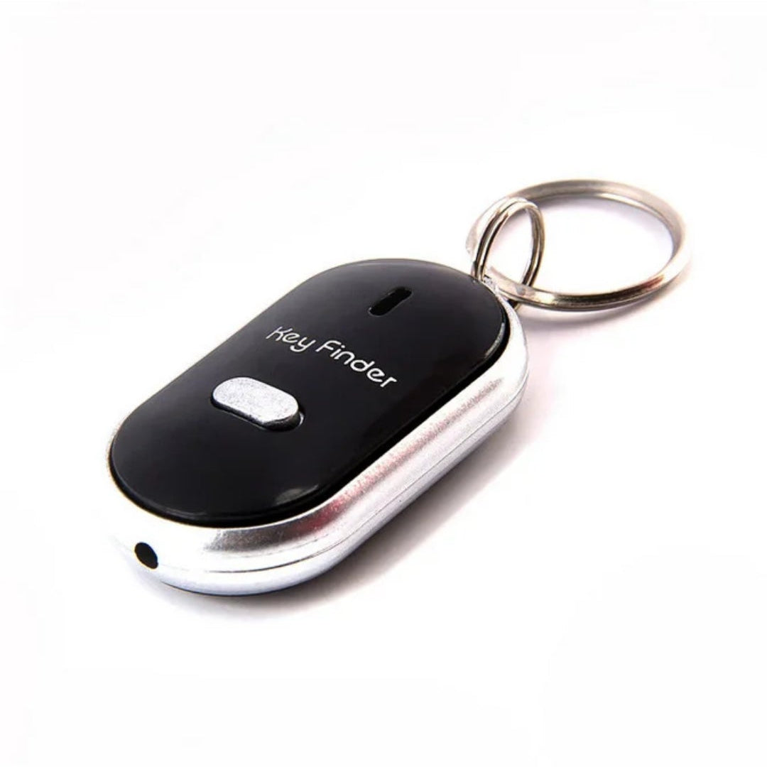 Black and silver keychain device with 'dog finder' text on a white background
