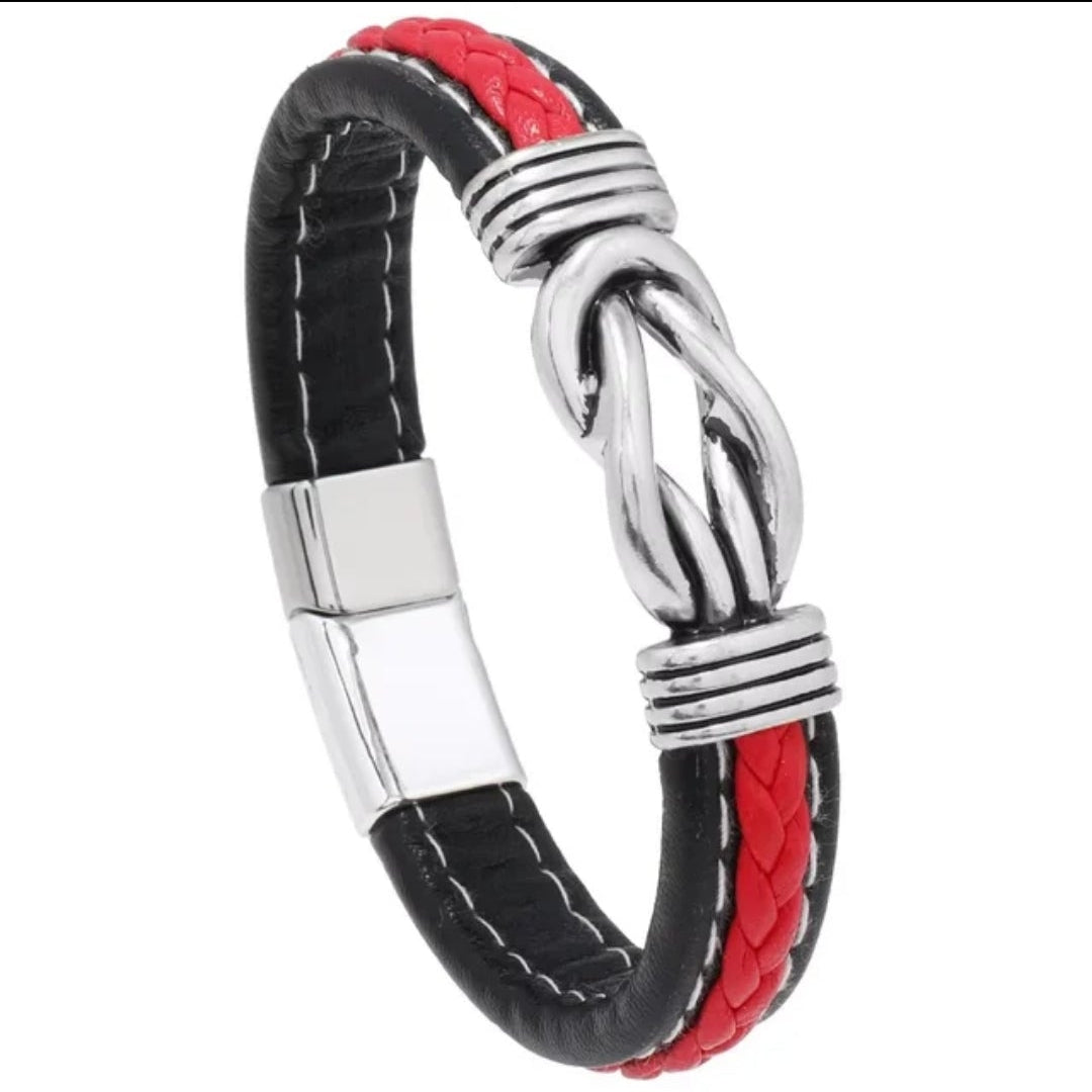 Black and red leather bracelet with silver clasp on a white background