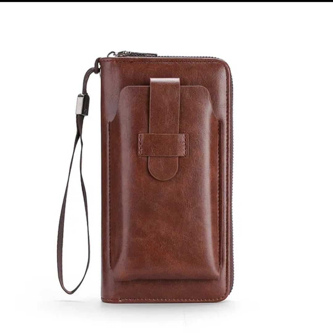 Brown leather wallet with a strap on a white background