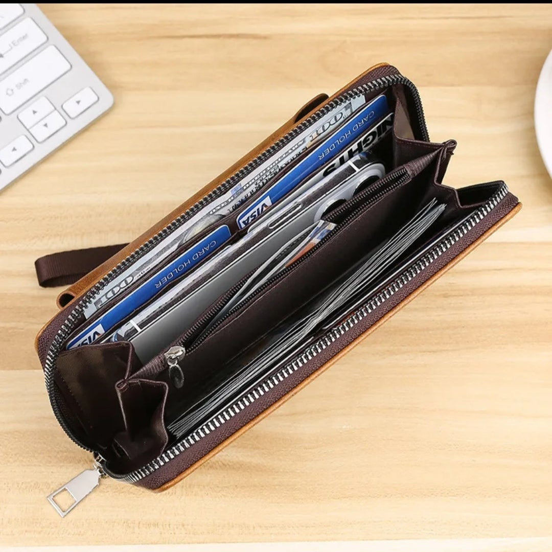Open black leather wallet with pens on a wooden surface, product page interface visible