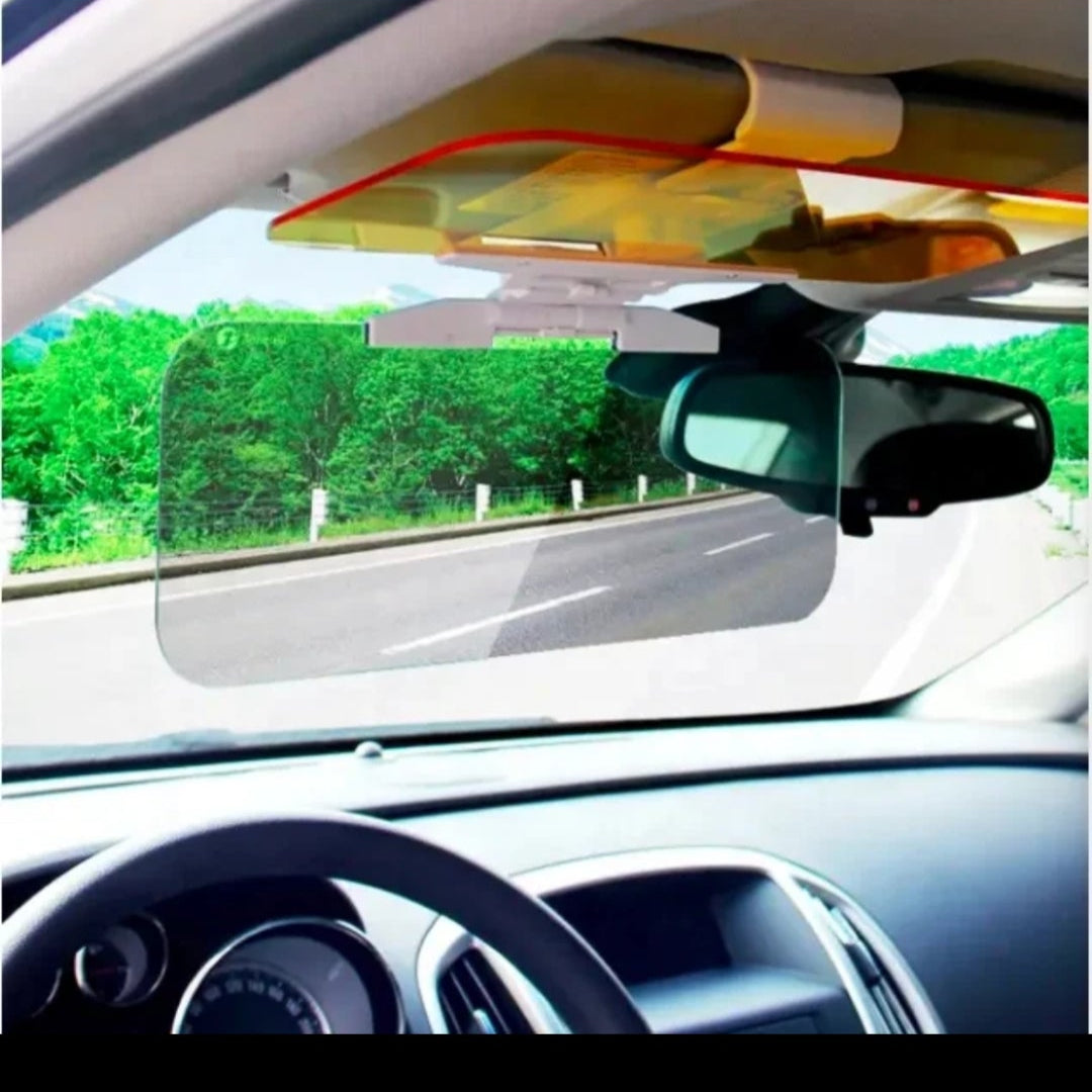 Car interior with a sun visor and windshield view