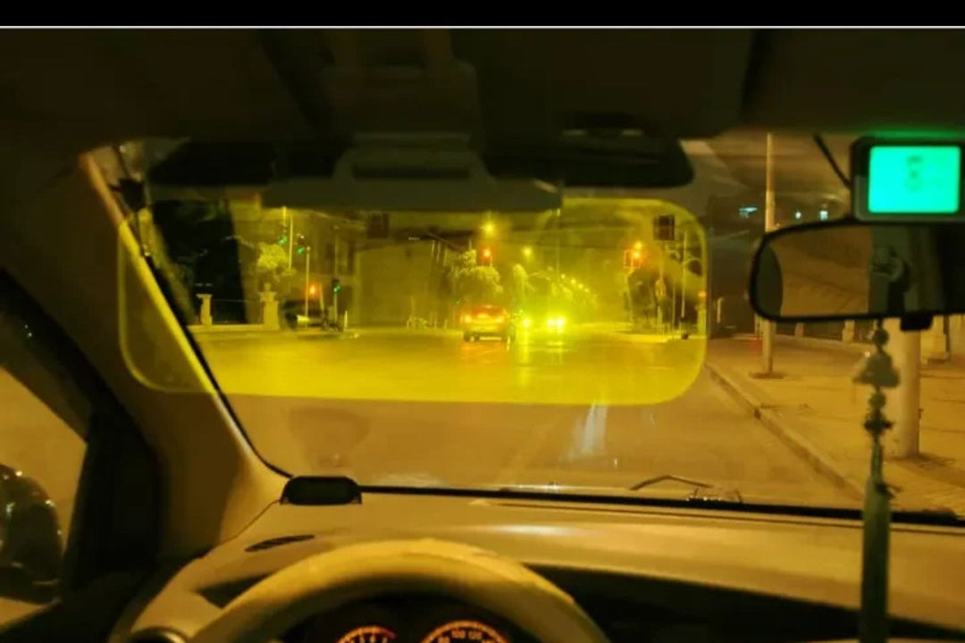 Car interior with a yellow light on the dashboard, showing a smartphone interface with options like 'Add to cart' and 'Start order'.
