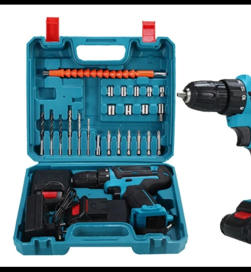 Electric drill with accessories in a blue case on a black background